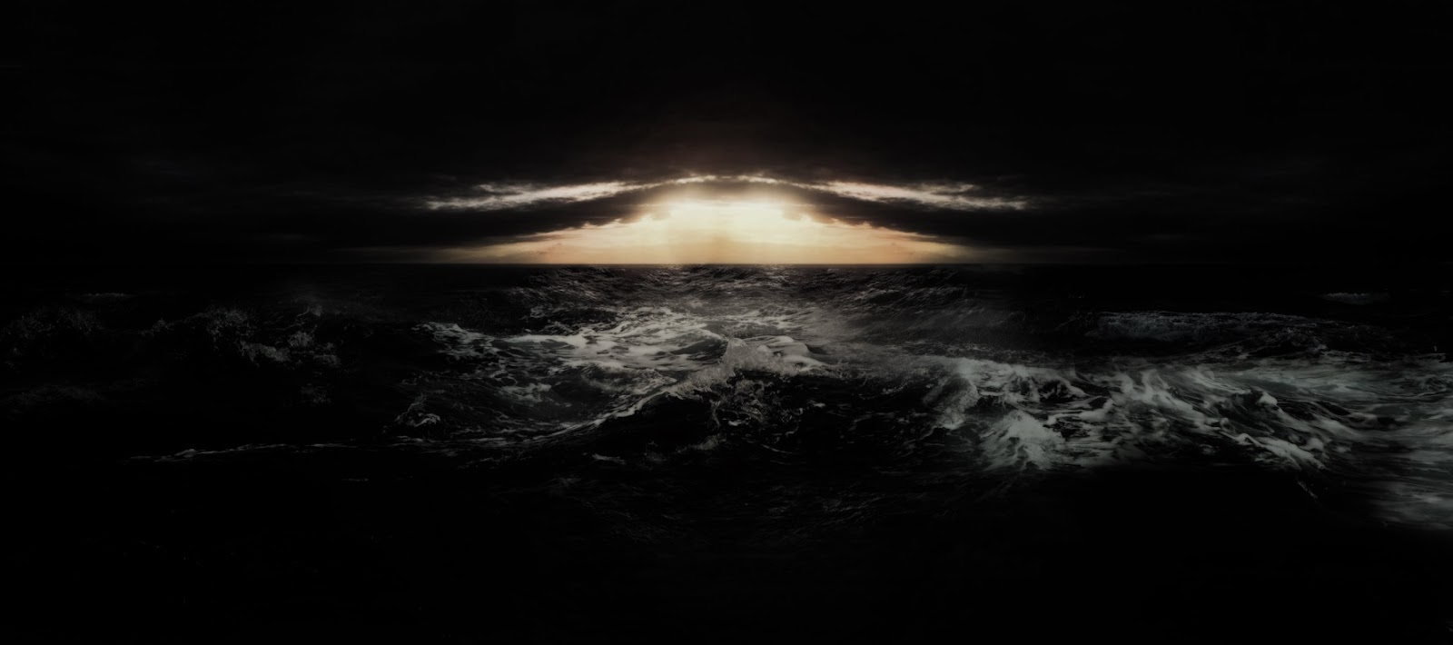 A dim sun over a black sea